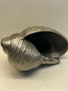 Silver coated metal conch seashell sculpture